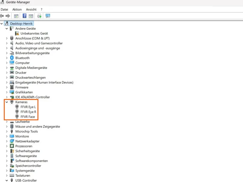 Device Manager showing three camera devices confirming successful installation