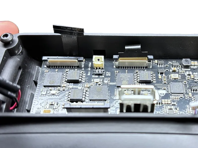 Ribbon cable gently bent and connected to the mainboard