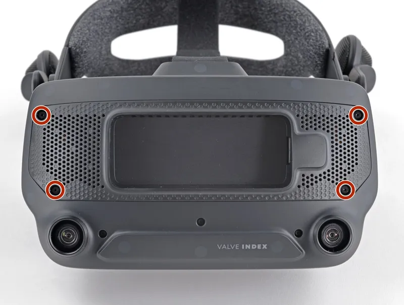 Four T5 Torx screws highlighted on the motherboard cover