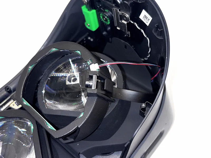 Right LED cable being routed along the same path as step 6